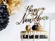 Smeigtukas-dekoracija Happy New Year Gold 24 cm (1 dėž/ 50 vnt) kaina ir informacija | Vienkartiniai indai šventėms | pigu.lt