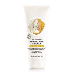 Raminantis ir regeneruojantis kūno losjonas The Body Shop Almond Milk & Honey 200 ml kaina ir informacija | Kūno kremai, losjonai | pigu.lt