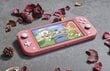 Nintendo Switch Lite (Coral) Animal Crossing цена и информация | Žaidimų konsolės | pigu.lt