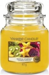 Ароматическая свеча Yankee Candle Tropical Starfruit 411 г цена и информация | Подсвечники, свечи | pigu.lt