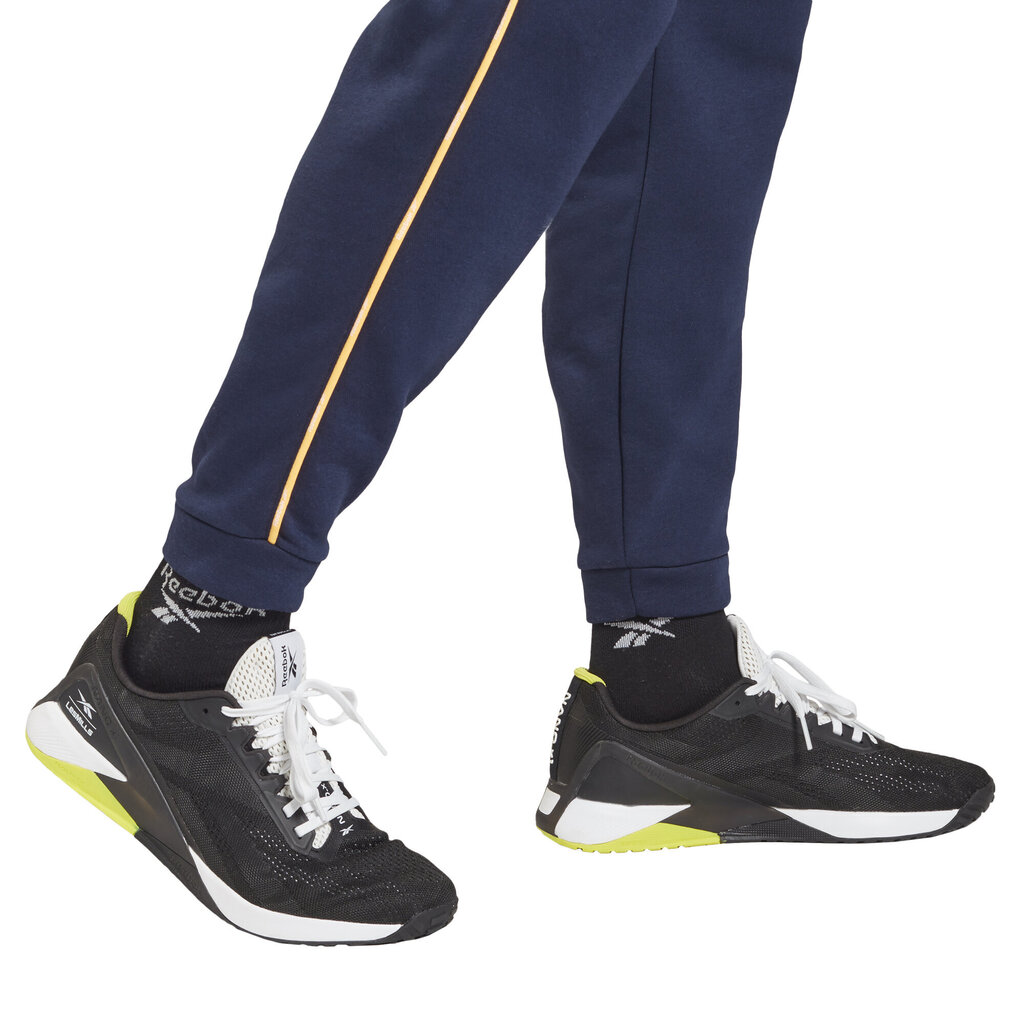 Sportinės kelnės vyrams Reebok Te Piping Jogger Blue GT5798, mėlynos цена и информация | Sportinė apranga vyrams | pigu.lt