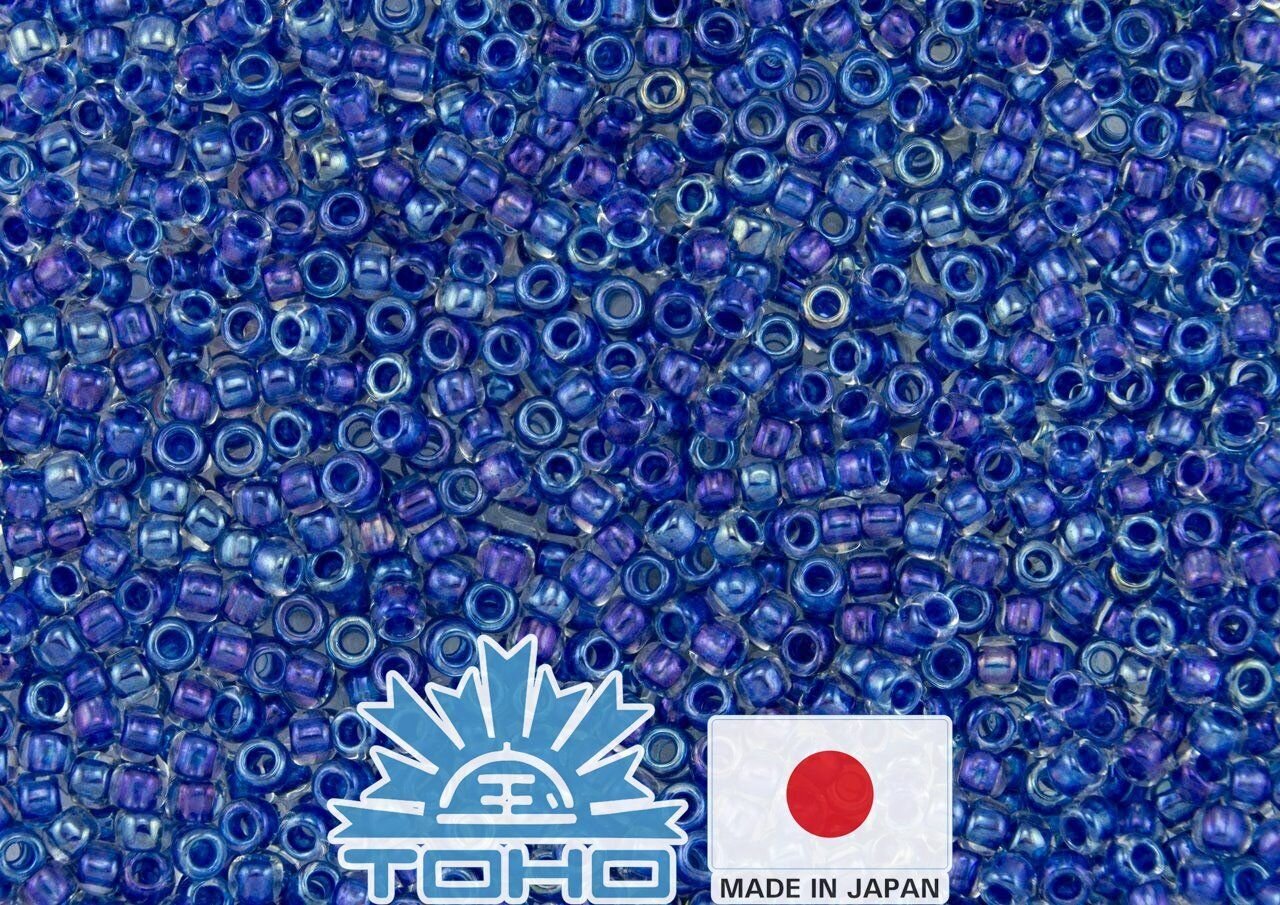 TOHO® Biseris Inside-Color Luster Crystal/Caribbean Blue-Lined 11/0 (2,2 mm) 10 g. цена и информация | Papuošalų gamybai, vėrimui | pigu.lt