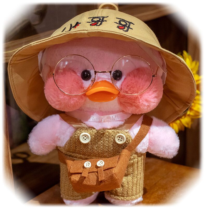 Minkštas pliušinis ančiukas lalafanfan su rudu rankinuku ir skrybėle, 32cm kaina ir informacija | Minkšti (pliušiniai) žaislai | pigu.lt