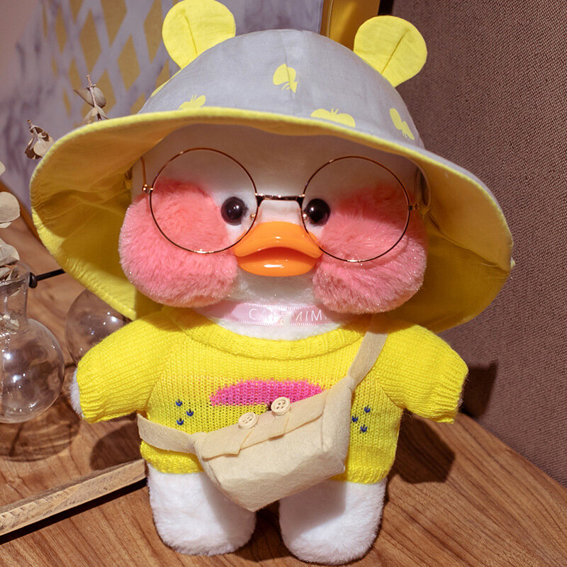 Minkštas pliušinis ančiukas lalafanfan su geltonu megztiniu, 32cm kaina ir informacija | Minkšti (pliušiniai) žaislai | pigu.lt