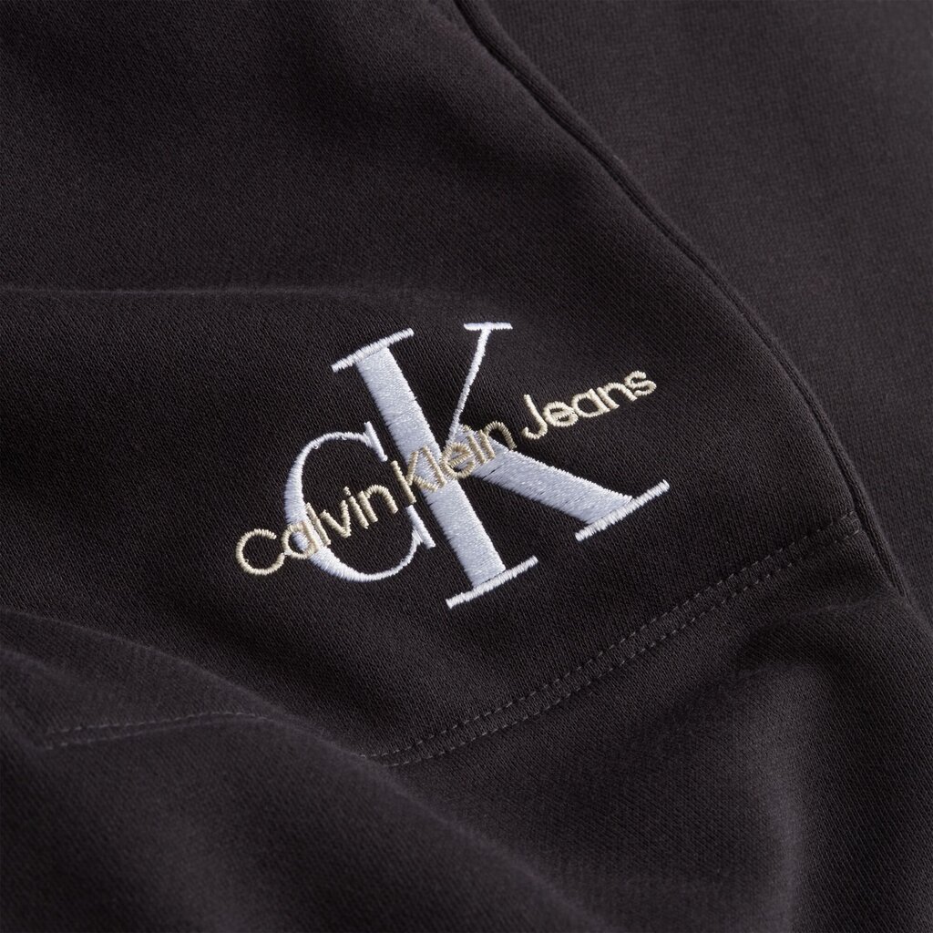 Calvin Klein moteriškos kelnės 49860, juodos kaina ir informacija | Sportinė apranga moterims | pigu.lt