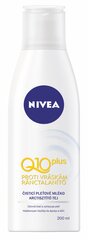 Молочко для очистки лица Nivea Q10 Plus, 200 мл цена и информация | Кремы, лосьоны для тела | pigu.lt