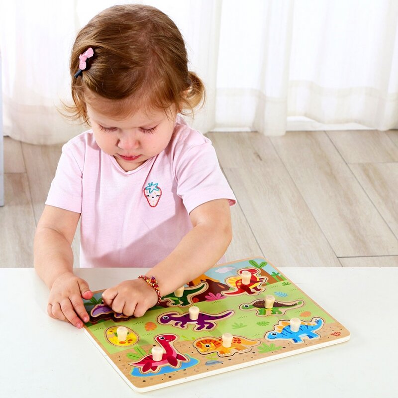 Medinė dinozaurų dėlionė mažyliams Tooky Toy, 10 dalių kaina ir informacija | Žaislai kūdikiams | pigu.lt