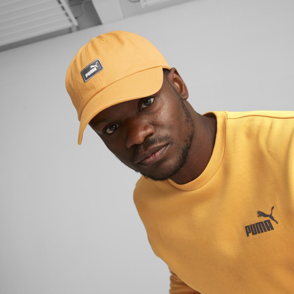 Puma kepurė vyrams Ess Cap Desert Clay Orange 023669 11, geltona kaina ir informacija | Vyriški šalikai, kepurės, pirštinės | pigu.lt