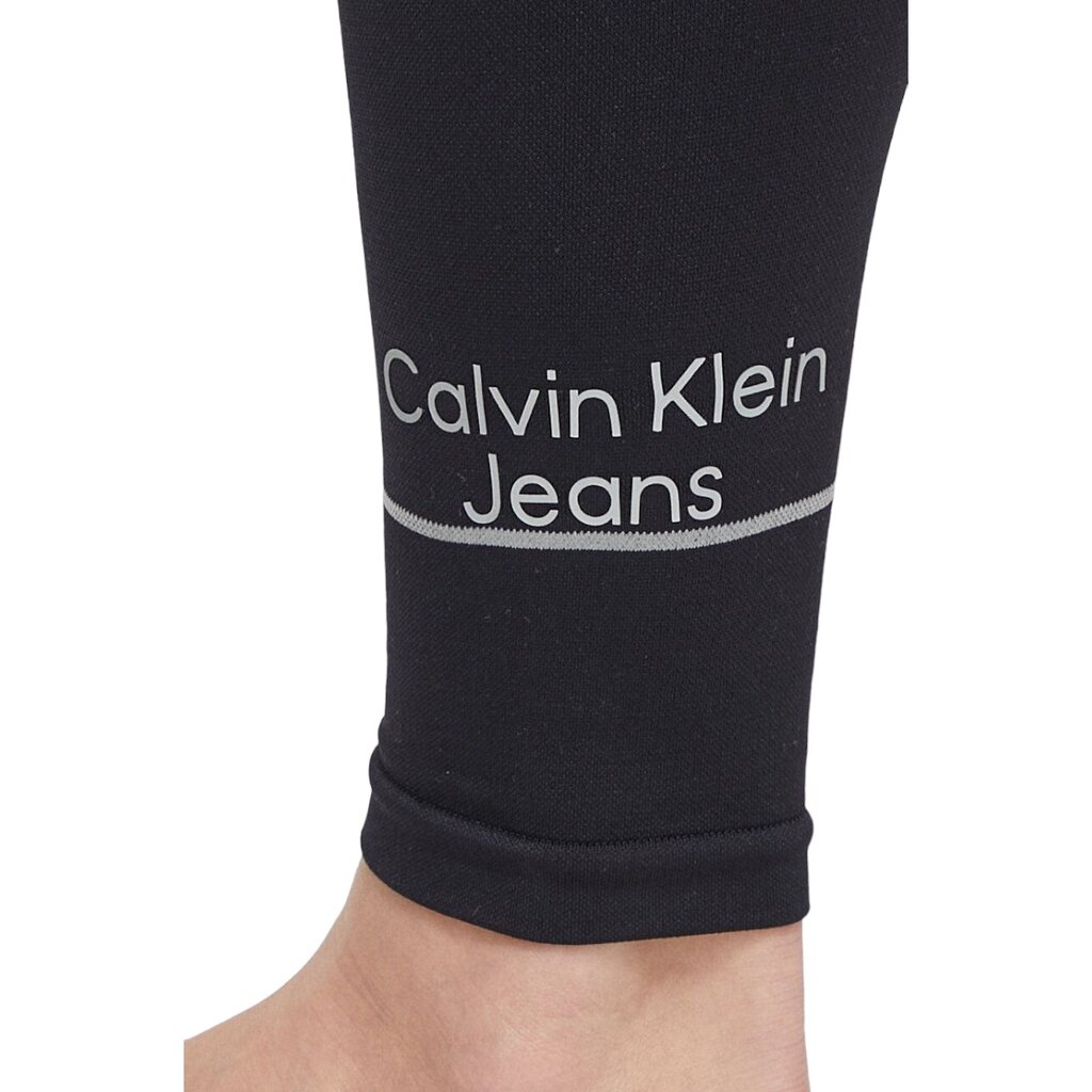 Calvin Klein tamprės moterims, juodos цена и информация | Kelnės moterims | pigu.lt