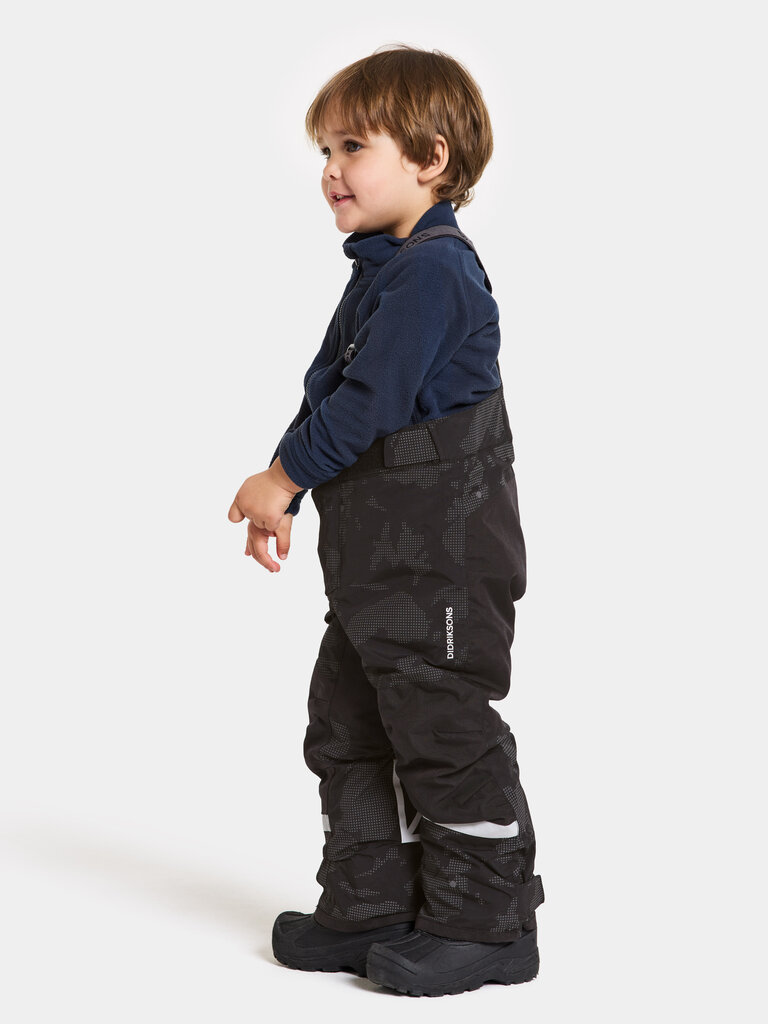 Didriksons vaikiškos žieminės kelnės IDRE, juoda šviesą atspindinčio rašto kaina ir informacija | Žiemos drabužiai vaikams | pigu.lt