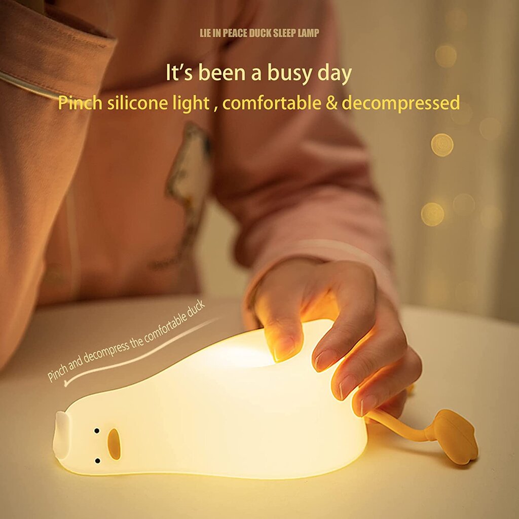 Naktinė vaikiška lempa - silikoninė gulinti antis - GOAPA цена и информация | Vaikiški šviestuvai | pigu.lt