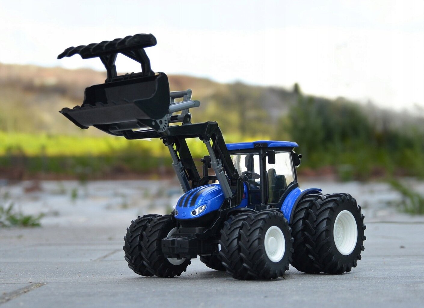 Nuotoliniu būdu valdomas traktorius su griebtuvu Korody, mėlynas kaina ir informacija | Žaislai berniukams | pigu.lt