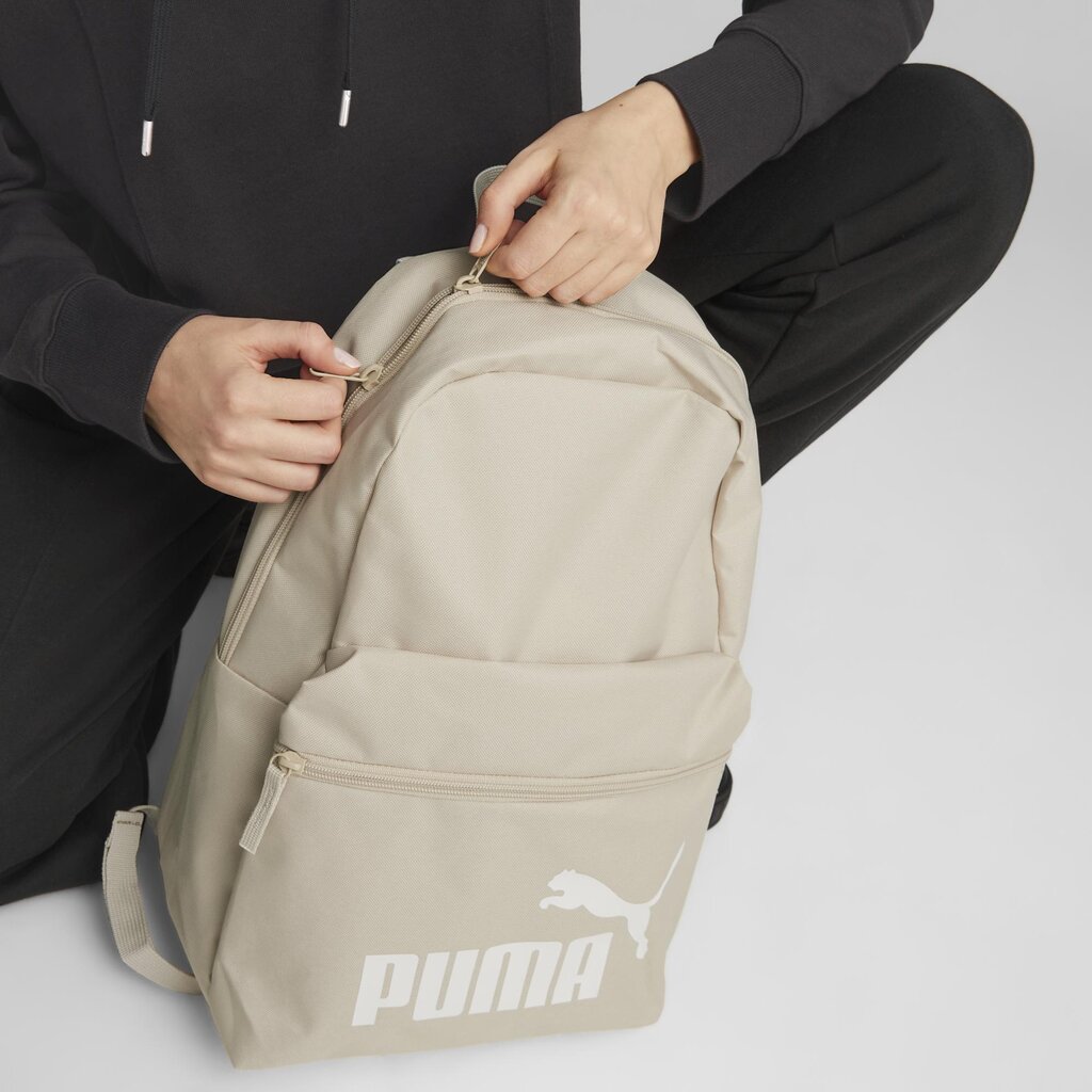 PUMA smėlios spalvos laisvalaikio kuprinė suaugusiems PUMA Phase Backpack Granola - 07548794 07548794.X kaina ir informacija | Moteriškos rankinės | pigu.lt